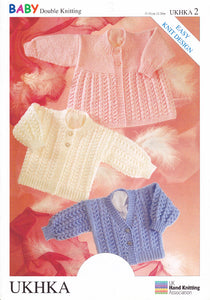 Double Knitting Pattern - UKHKA 2 Baby Cardigans & Matinee Coat
